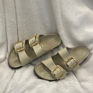 Stylish Beige Birkenstocks with Gold Buckles